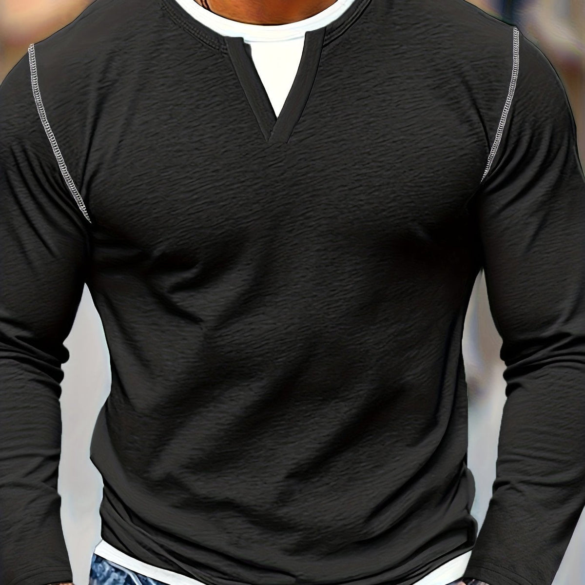 Men's notch-neck contrast-stitch henley shirt in black, front view