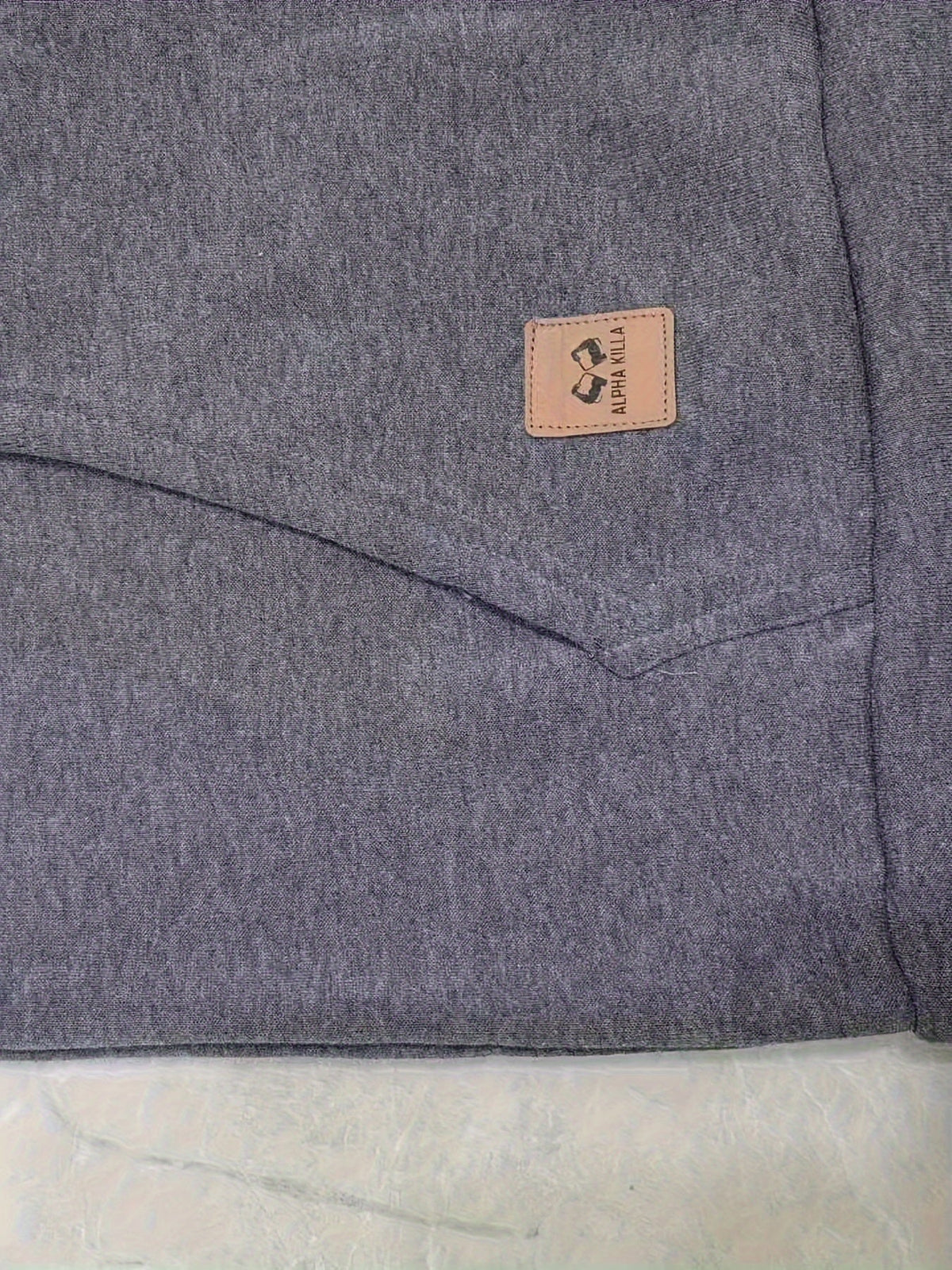 Men's utility quarter-zip hoodie in black, navy, khaki and burgundy with pocket detail, colour option 2 back view