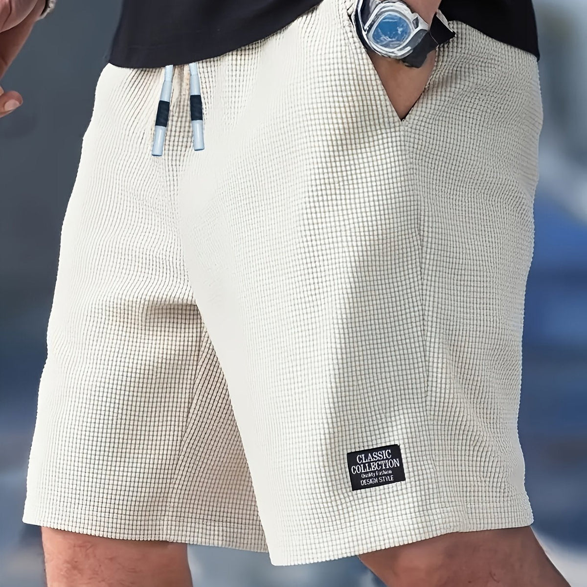 Kessoro Men's Textured Drawstring Relaxed Casual Shorts in black, khaki, beige and white — styled on model