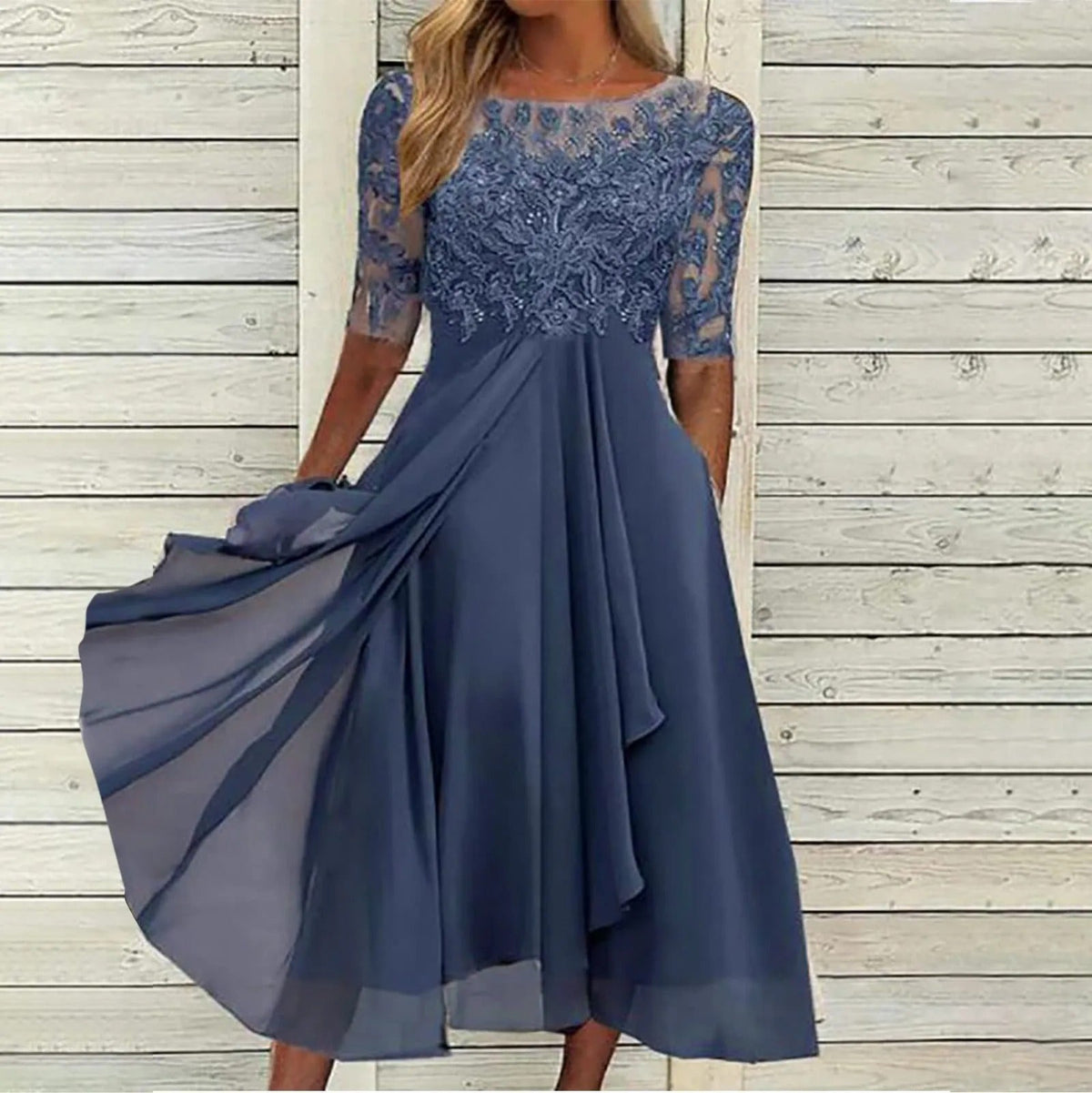 Women's draped elegant evening dress in blue, pink, white and green, shown for womenswear styling