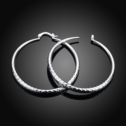 Kessoro women's retro silver tone long drop earrings with an elongated silhouette