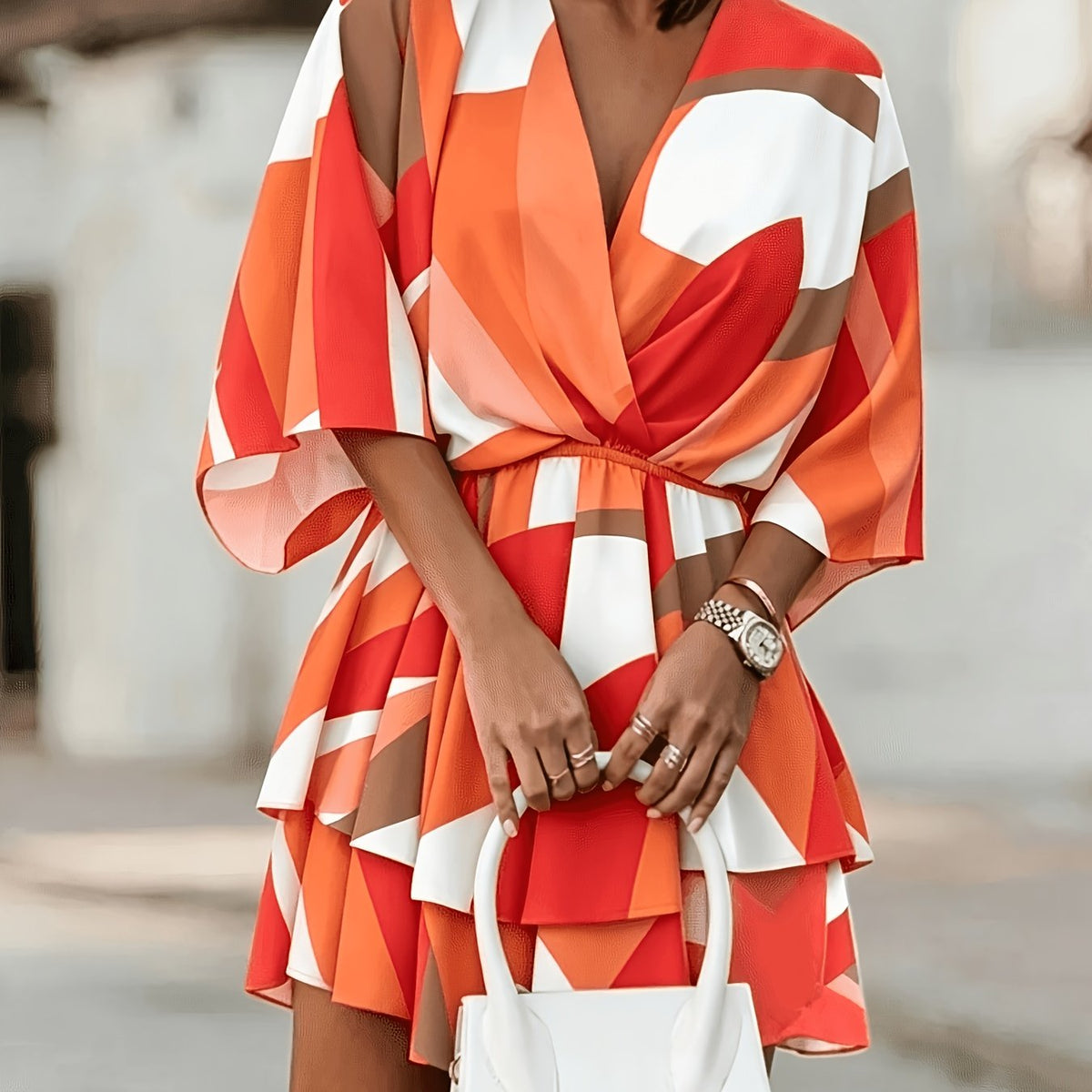 Kessoro women's batwing-sleeve tiered wrap dress shown in orange red and black colourways on a female model