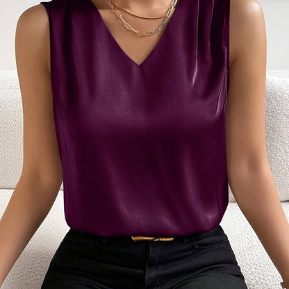 Women's sleeveless draped V-neck blouse in a refined solid colourway
