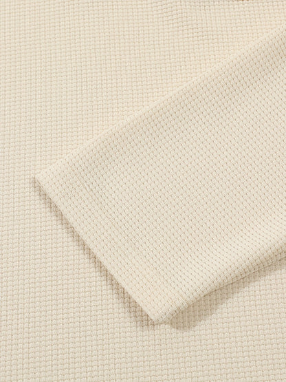 Men's textured long sleeve henley shirt in khaki, white, black, grey and burgundy, close-up view
