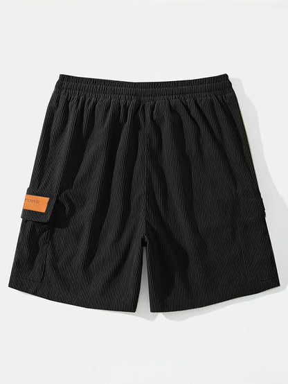 Men's textured drawstring cargo shorts in black, apricot and grey, view 6