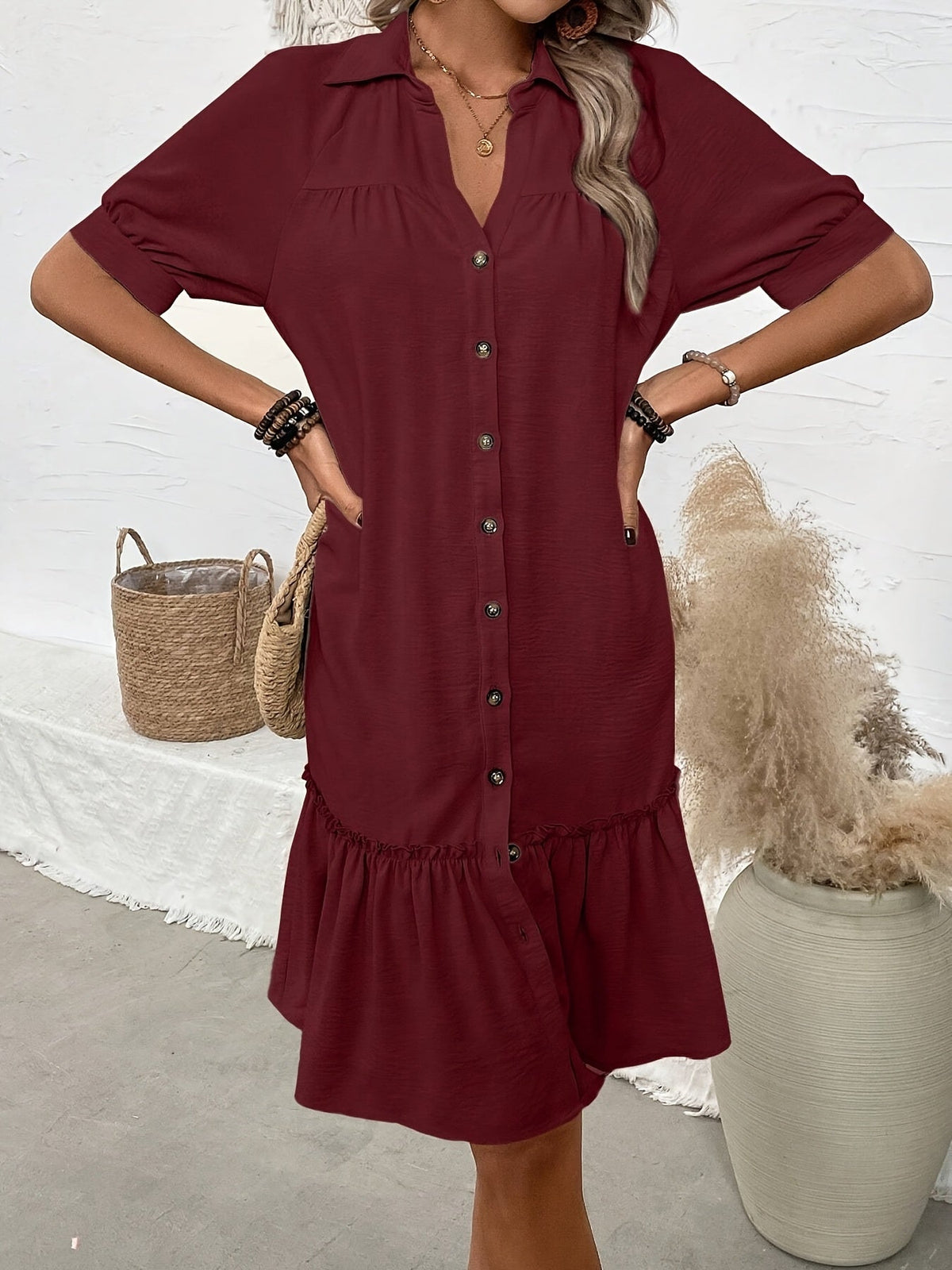 Women's button-front boho midi dress with pleated hem and rolled half sleeves