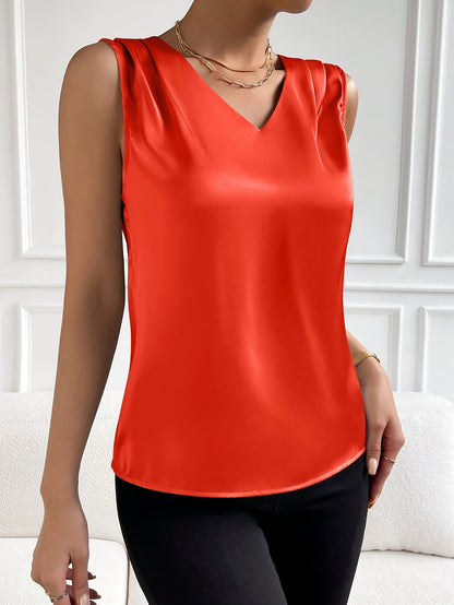 Women's sleeveless draped V-neck blouse in a refined solid colourway