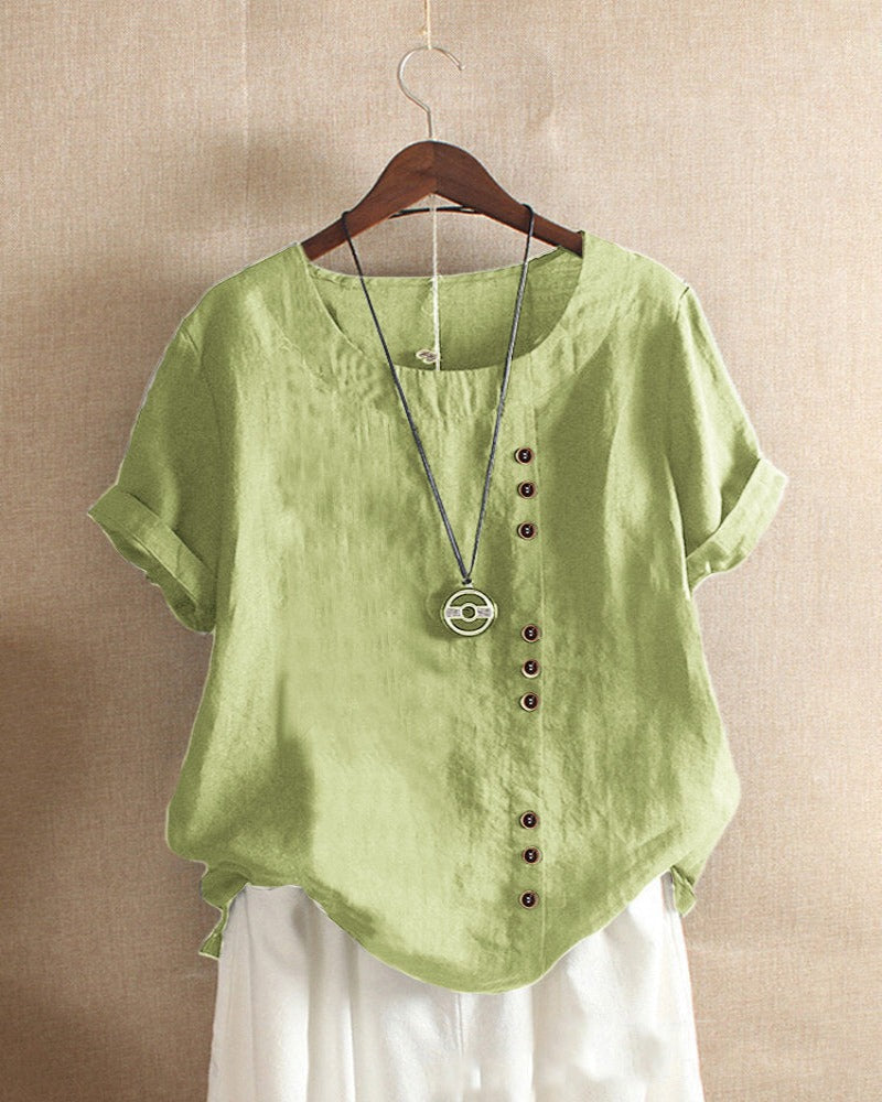 Women's asymmetrical button detail lightweight summer blouse in nine colourways, shown for womenswear styling