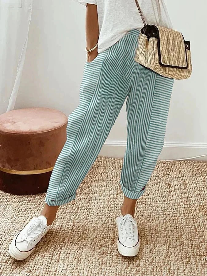 Women's relaxed striped lightweight summer trousers in six colourways, shown for womenswear styling