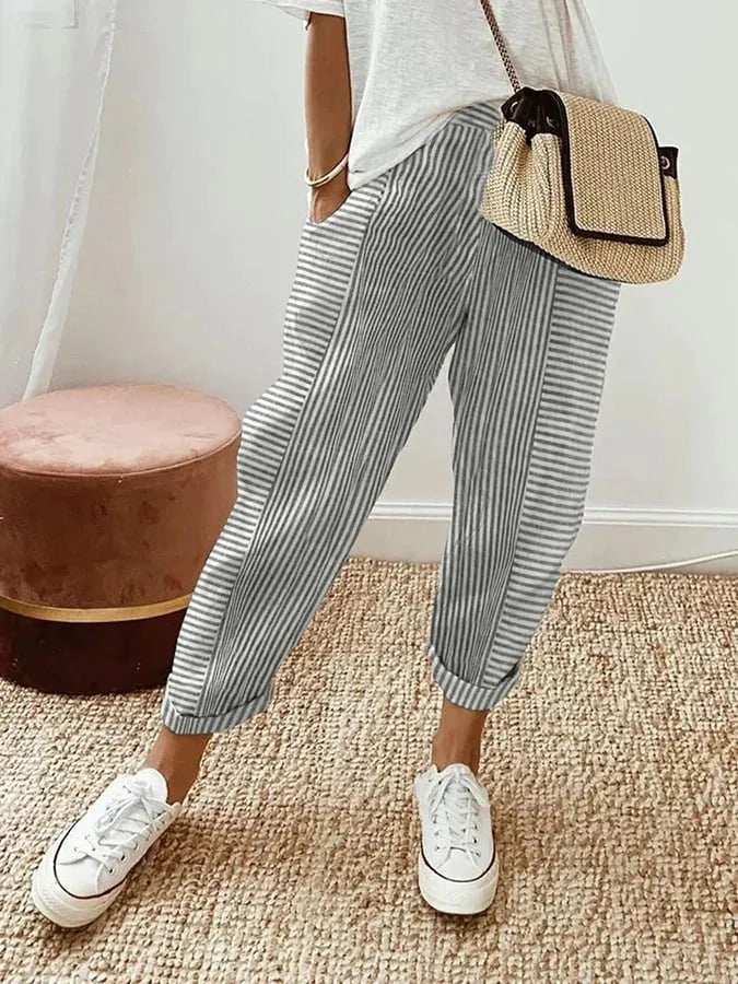 Women's relaxed striped lightweight summer trousers in six colourways, shown for womenswear styling