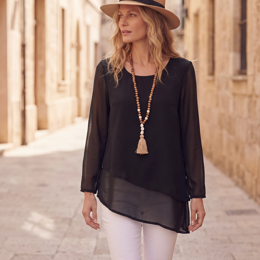 Kessoro Sienna layered sheer irregular-hem blouse, styled on a city street