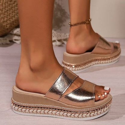 Women's platform open toe sandal in metallic silver with a comfortable platform sole