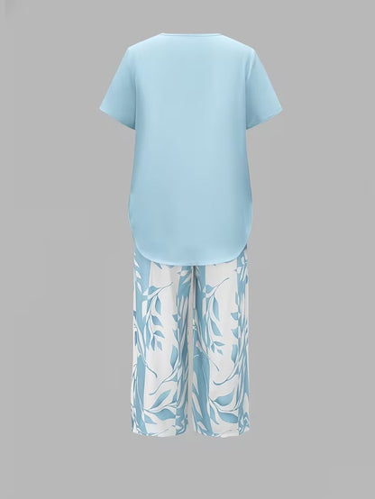 Kessoro women's leaf print top and trouser two-piece set in green, purple, red and sky blue