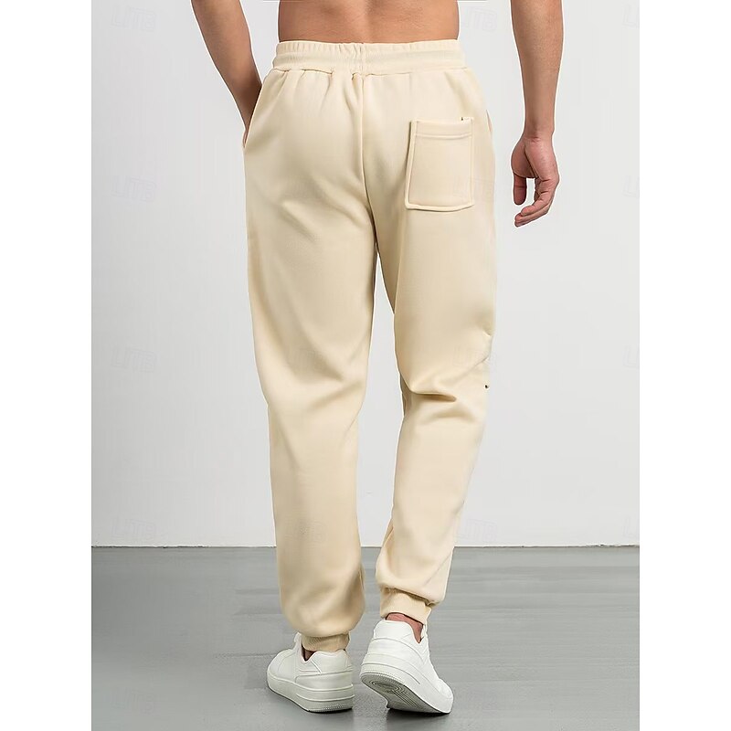 Kessoro unisex relaxed tapered drawstring joggers in apricot, green and blue