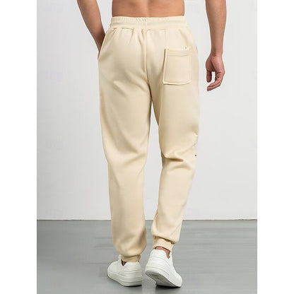 Kessoro unisex relaxed tapered drawstring joggers in apricot, green and blue