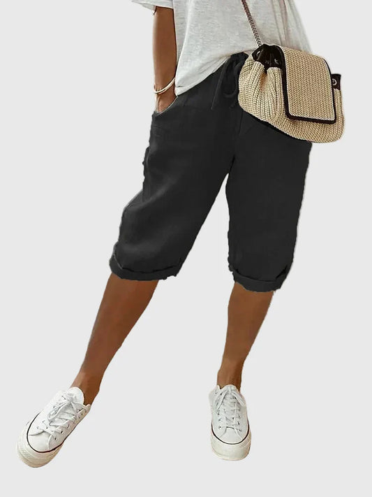 Women's soft cotton tailored comfort shorts in black, beige, green, blue and white, shown for womenswear styling