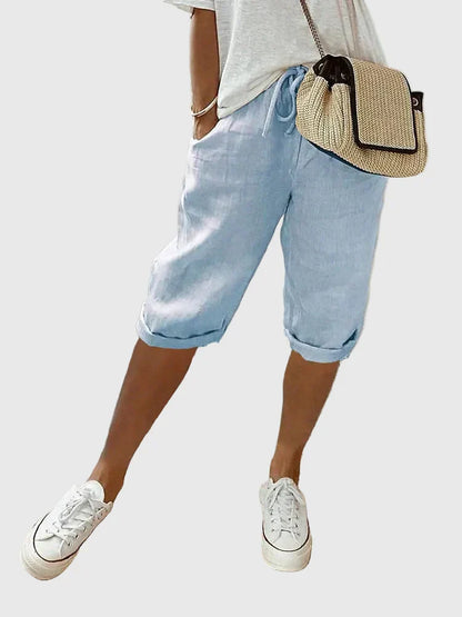 Women's soft cotton tailored comfort shorts in black, beige, green, blue and white, shown for womenswear styling