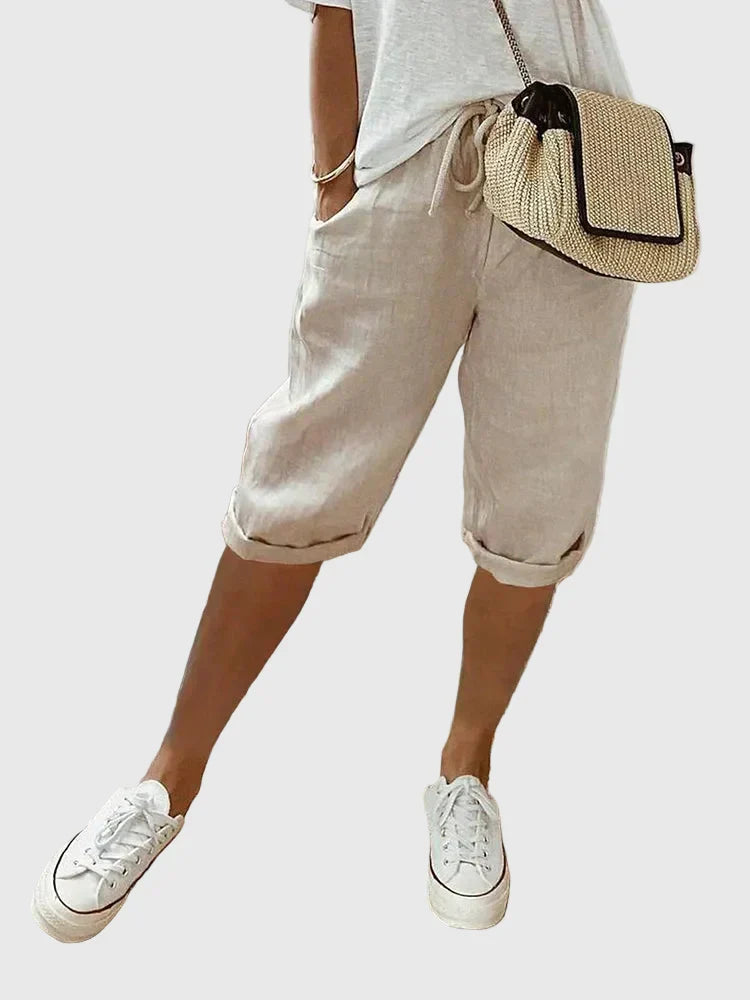 Women's soft cotton tailored comfort shorts in black, beige, green, blue and white, shown for womenswear styling