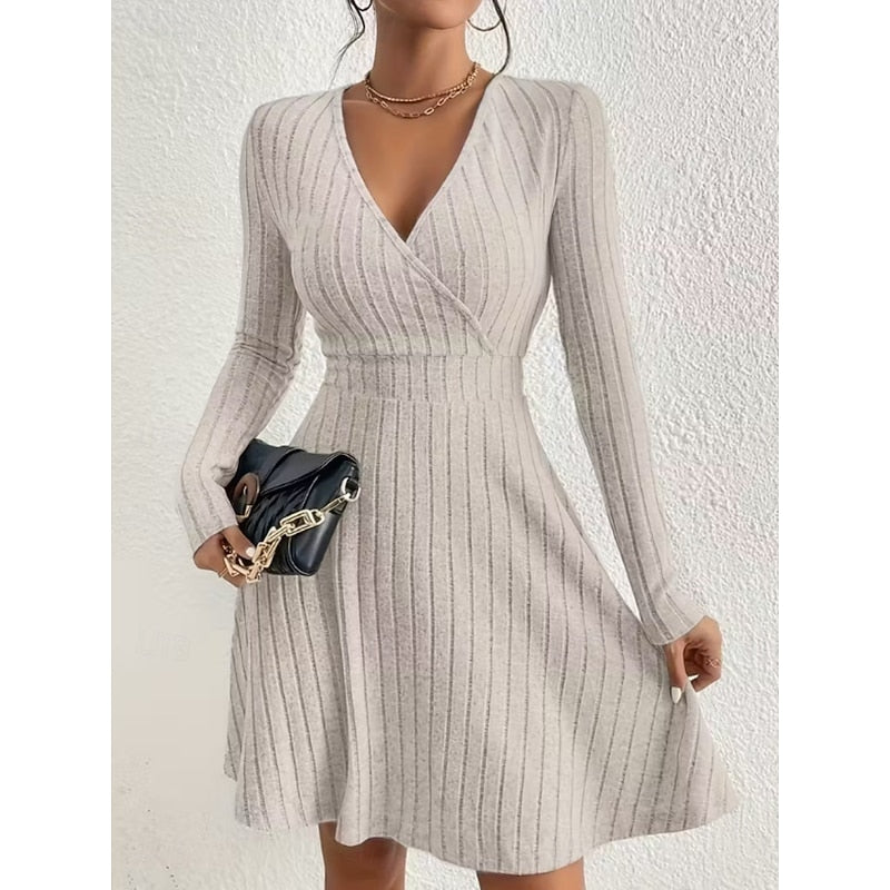 Kessoro women's wrap-neck A-line dress with a defined waist and softly flared skirt