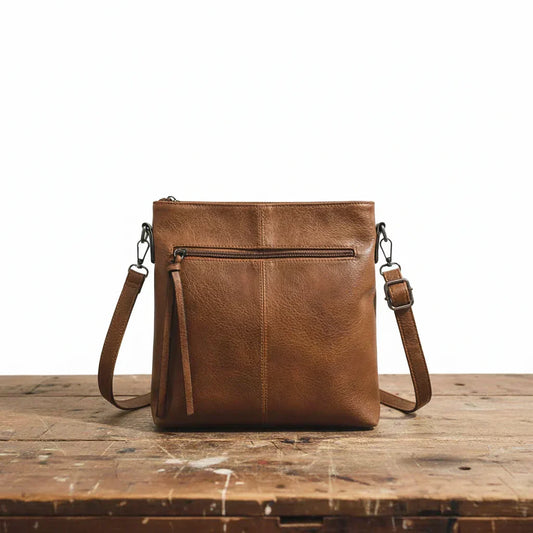 Kessoro women's casual zipper vegan leather sling bag in brown