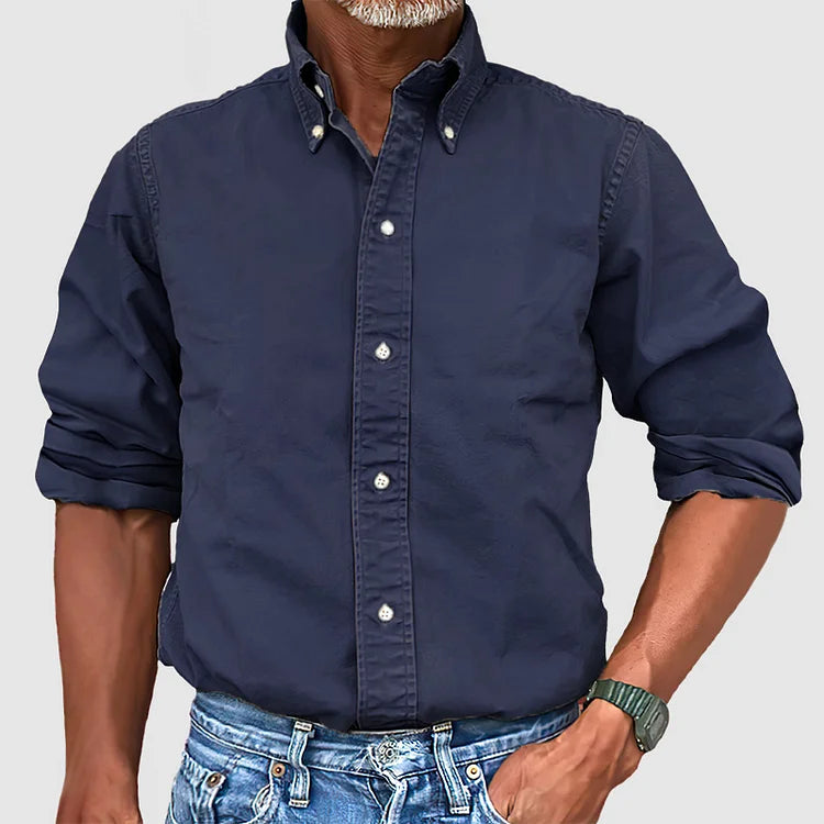 Men's classic tailored button-down shirt in a nine-colour neutral and blue range, shown for menswear styling