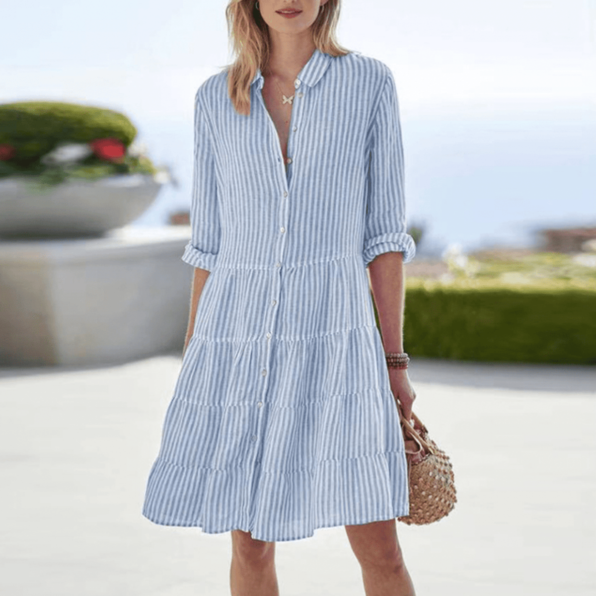 Women's breezy striped A-line midi dress in a light summer colourway