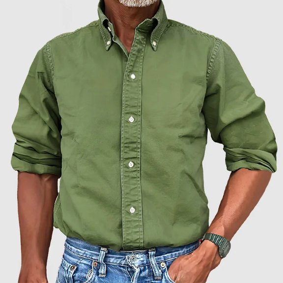 Men's classic tailored button-down shirt in a nine-colour neutral and blue range, shown for menswear styling