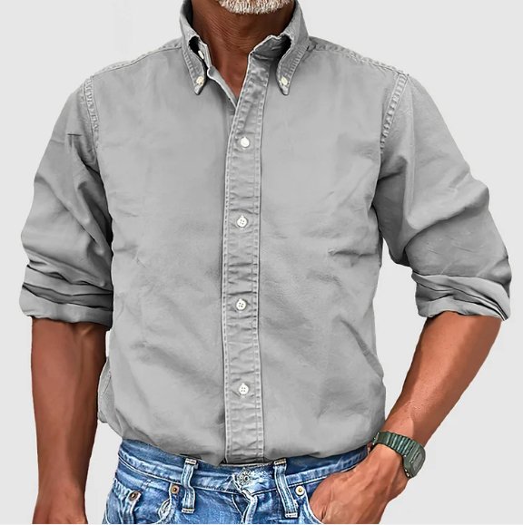Men's classic tailored button-down shirt in a nine-colour neutral and blue range, shown for menswear styling