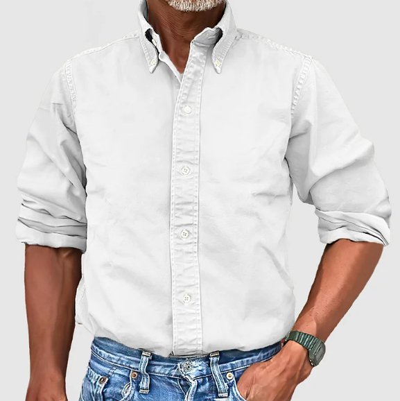 Men's classic tailored button-down shirt in a nine-colour neutral and blue range, shown for menswear styling
