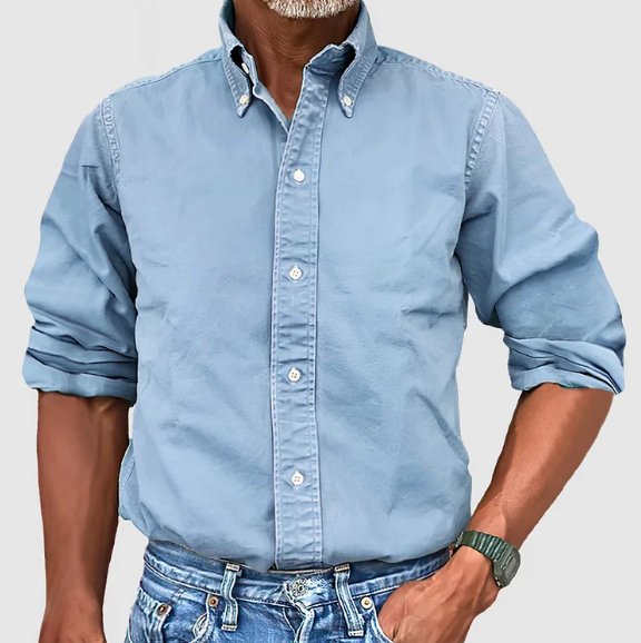 Men's classic tailored button-down shirt in a nine-colour neutral and blue range, shown for menswear styling
