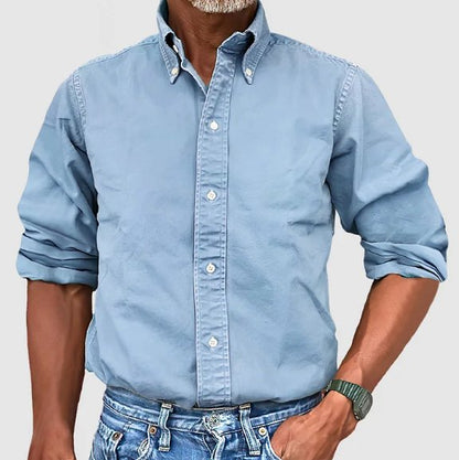 Men's classic tailored button-down shirt in a nine-colour neutral and blue range, shown for menswear styling