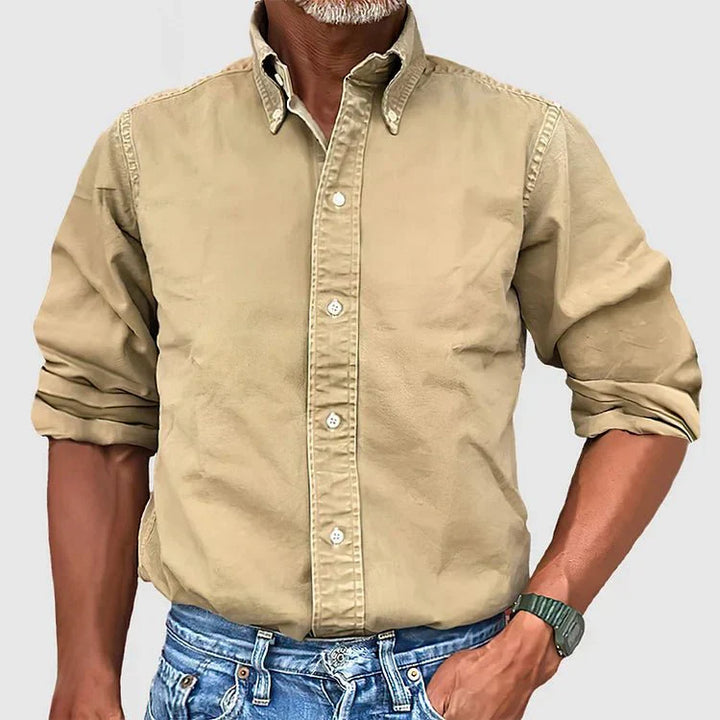 Men's classic tailored button-down shirt in a nine-colour neutral and blue range, shown for menswear styling
