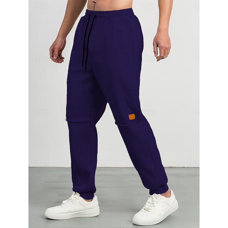 Kessoro unisex relaxed tapered drawstring joggers in apricot, green and blue