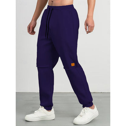 Kessoro unisex relaxed tapered drawstring joggers in apricot, green and blue