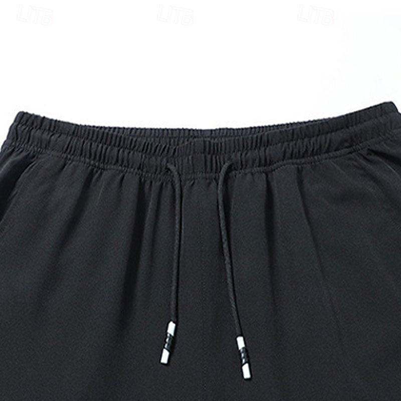 Men's relaxed straight-leg drawstring pants in light grey, black and navy, back view