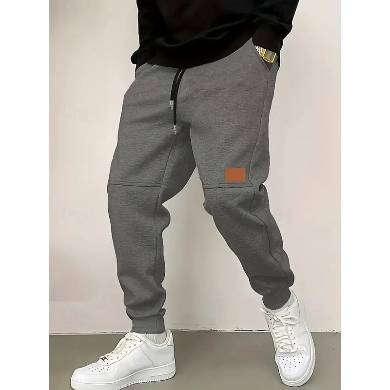 Kessoro unisex relaxed tapered drawstring joggers in apricot, green and blue
